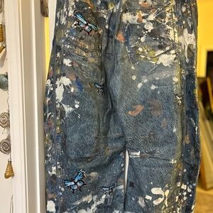 Artistic Paint Splatter Jeans with Butterfly Accents